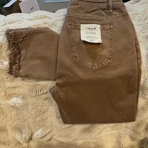 Charlie B Women's tan color straight leg Jeans with fringe ankle detail  size 10